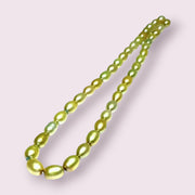 Smooth Oval 7 x 8.5mm Champagne Green Cultured FW Pearl 16" Strand