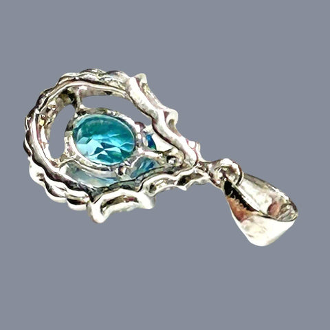 Marvelous Oval 5 x 7mm London Blue Topaz 925 Sterling Silver Pendant