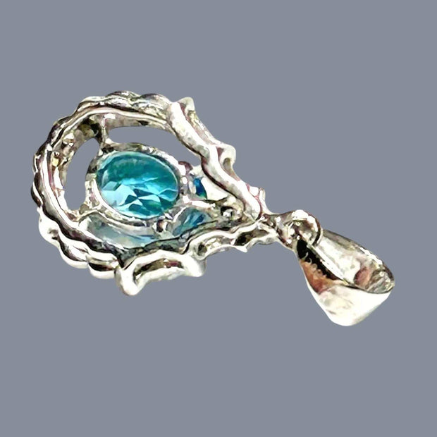 Marvelous Oval 5 x 7mm London Blue Topaz 925 Sterling Silver Pendant