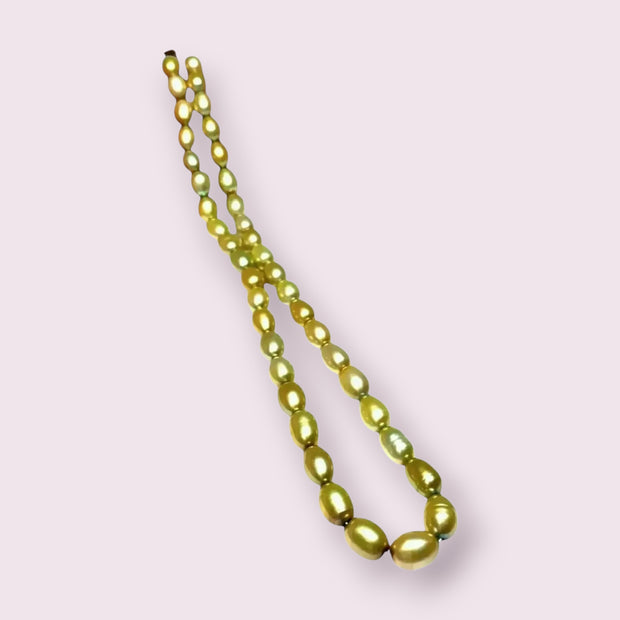 Smooth Oval 7 x 8.5mm Champagne Green Cultured FW Pearl 16" Strand