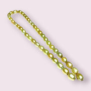 Smooth Oval 7 x 8.5mm Champagne Green Cultured FW Pearl 16" Strand