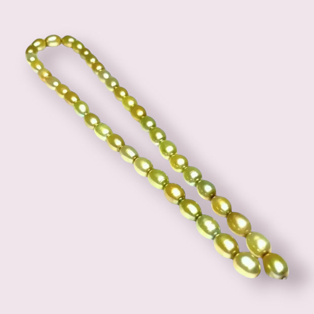 Smooth Oval 7 x 8.5mm Champagne Green Cultured FW Pearl 16" Strand