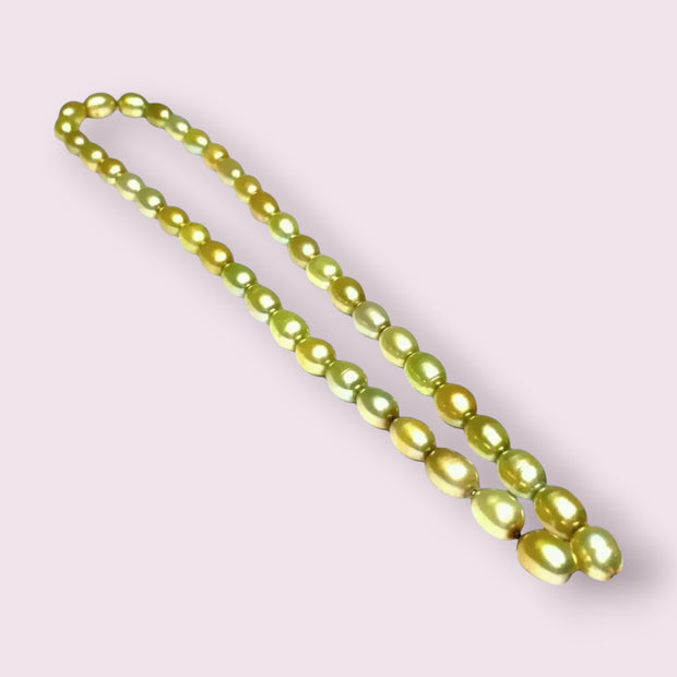 Smooth Oval 7 x 8.5mm Champagne Green Cultured FW Pearl 16" Strand