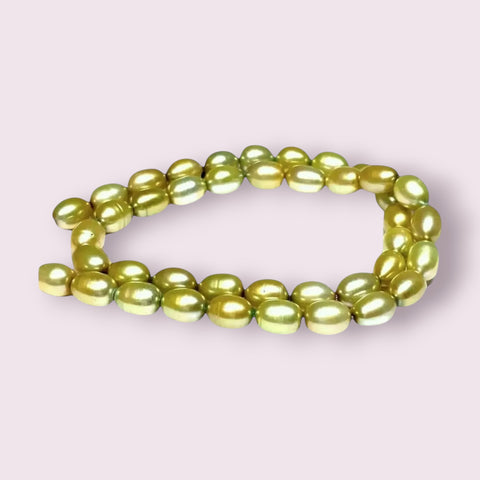 Smooth Oval 7 x 8.5mm Champagne Green Cultured FW Pearl 16" Strand