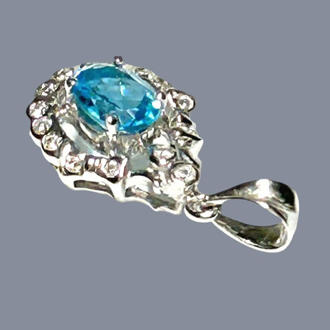 Marvelous Oval 5 x 7mm London Blue Topaz 925 Sterling Silver Pendant